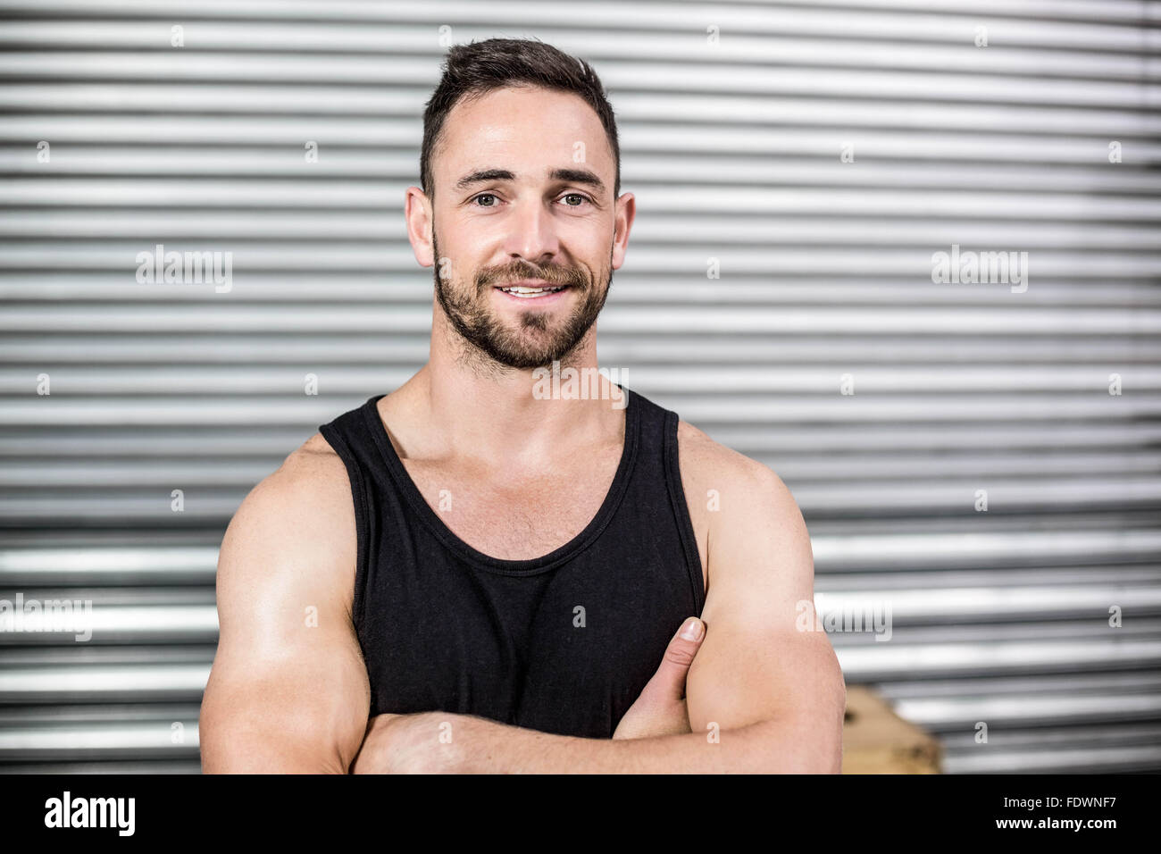 Serious fit man posing Stock Photo Alamy