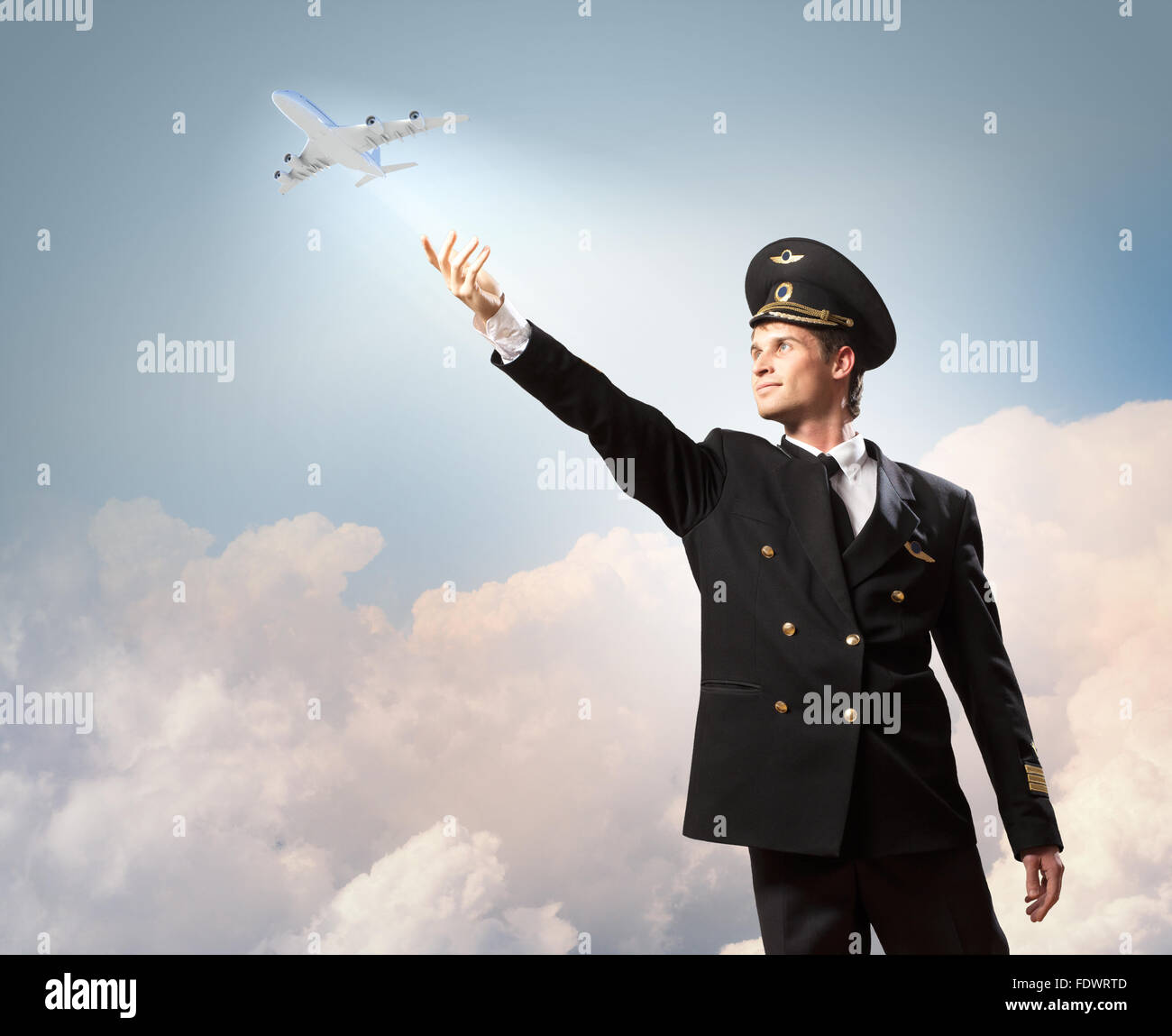 Image of pilot touching sky against airplane background Stock Photo - Alamy