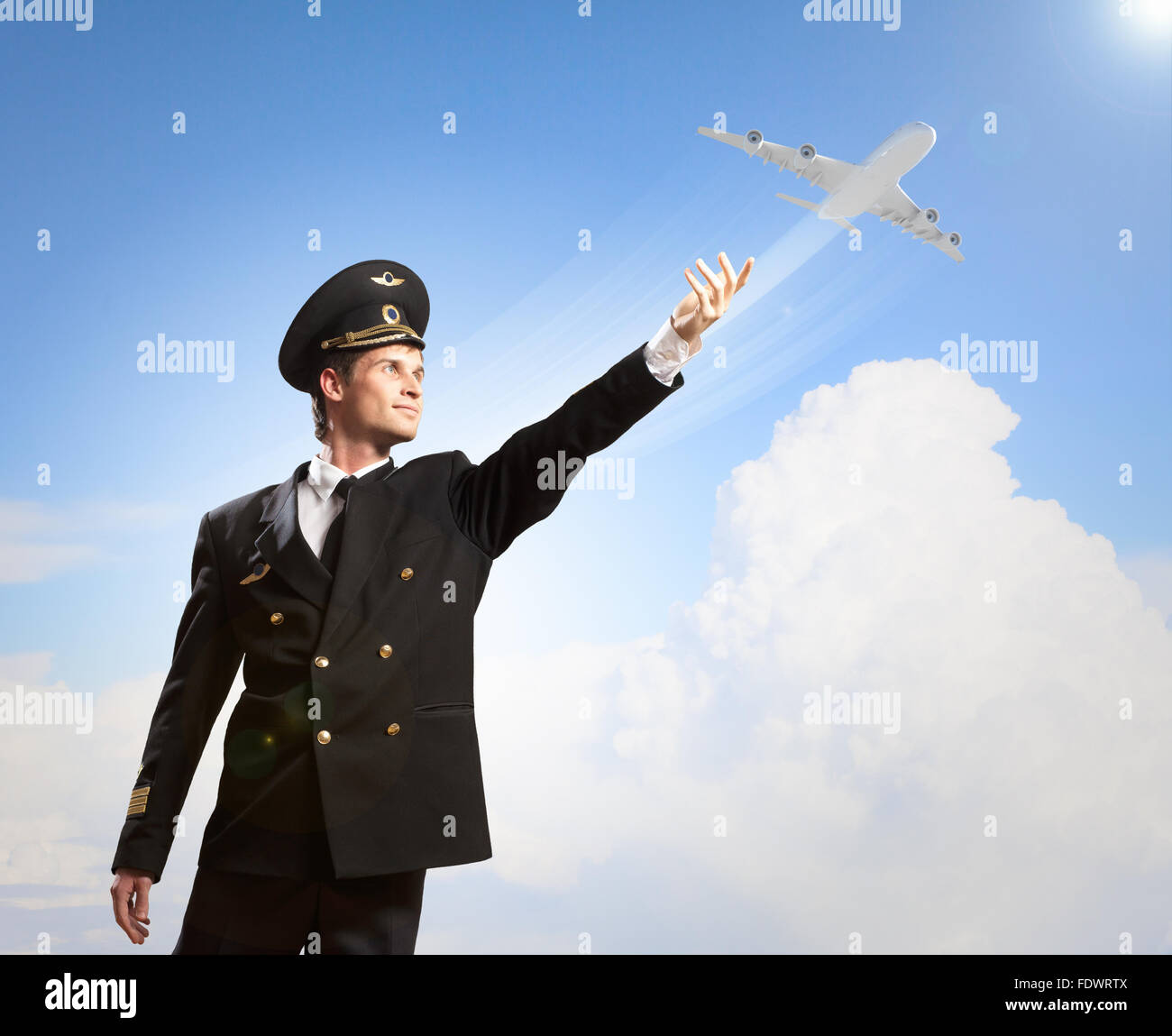 Image of pilot touching sky against airplane background Stock Photo - Alamy
