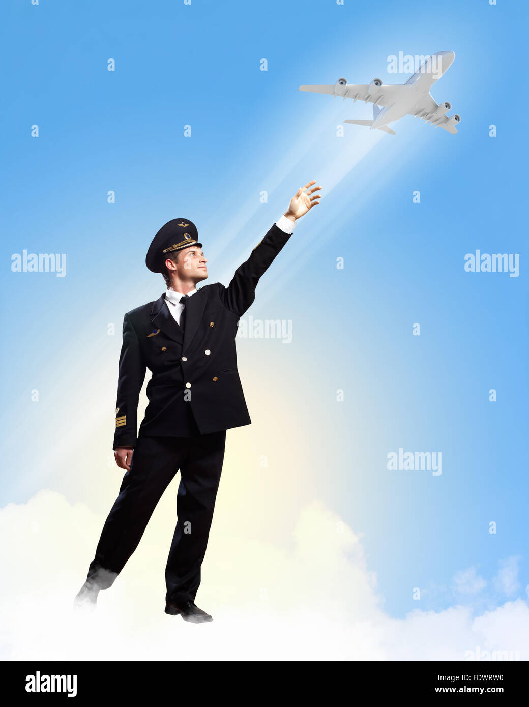 Image of pilot touching sky against airplane background Stock Photo - Alamy