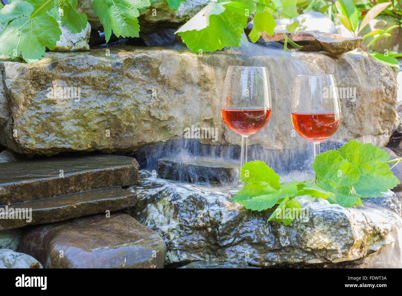 white and rosé wine in summer garden Stock Photo Alamy