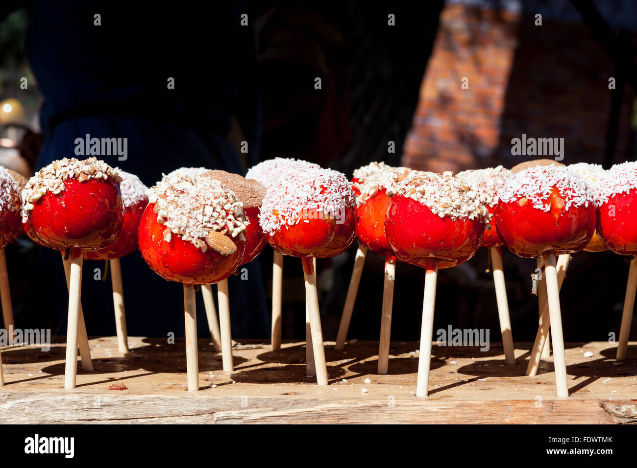 Candy apples for sale in market Stock Photo