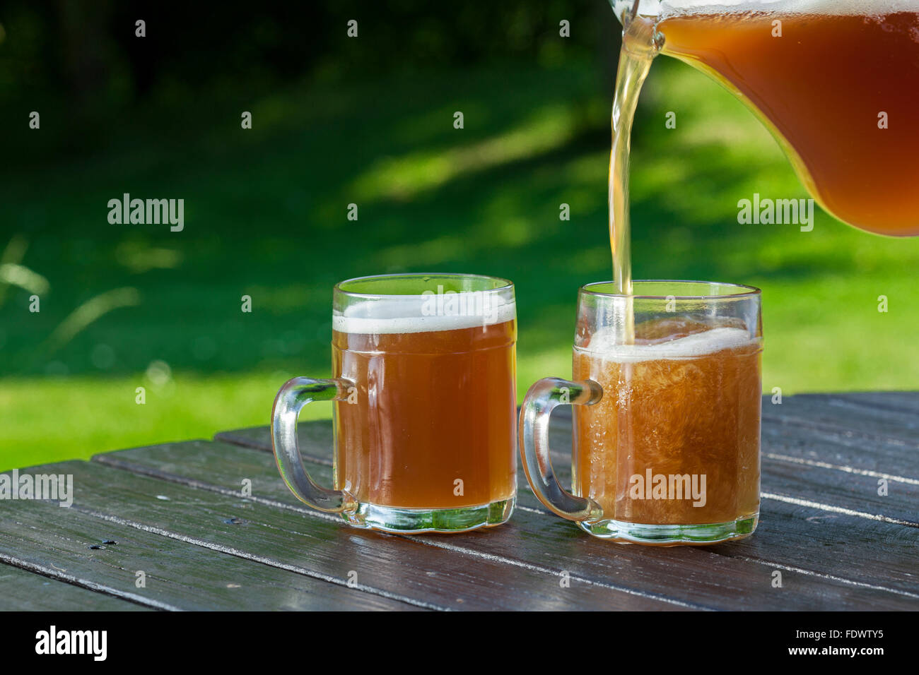 german chilled cold beer in garden Stock Photo - Alamy