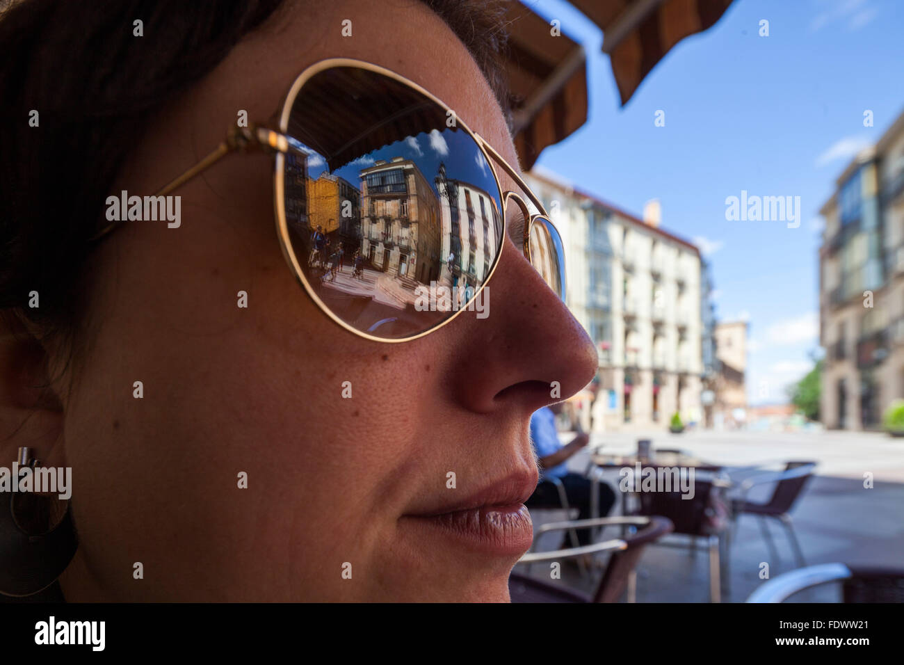 Soria, Spain, buildings of the city are reflected in sunglasses Stock Photo