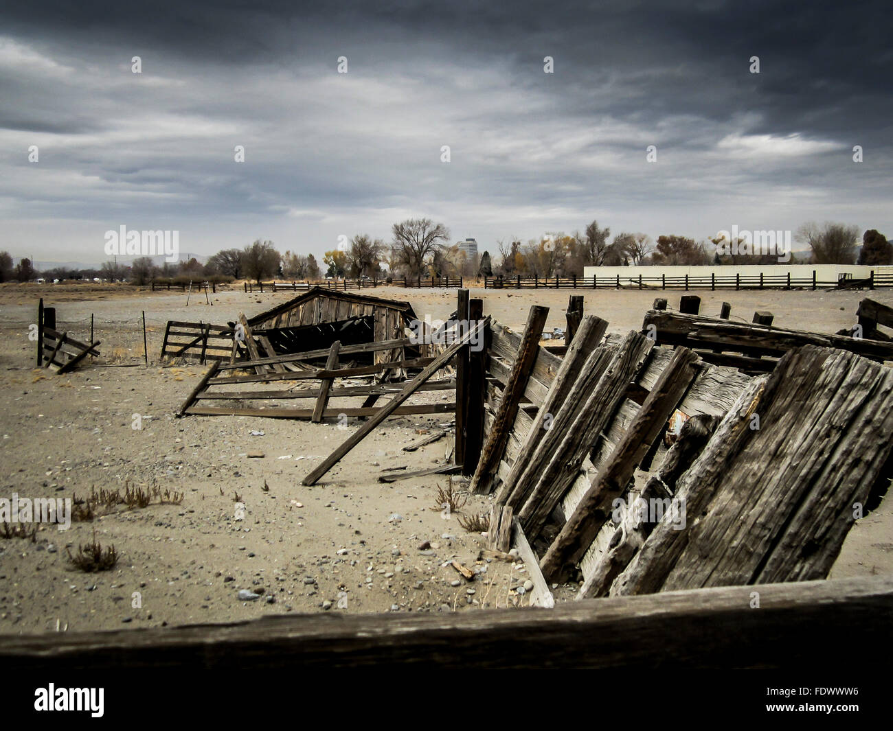 A ramshackle old wooden building in desolate open land, on a dreary winter's day. Stock Photo