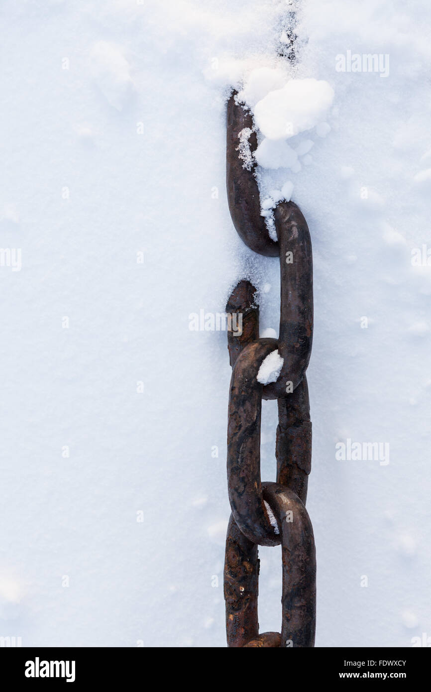 Strong chain in snow closeup Stock Photo Alamy