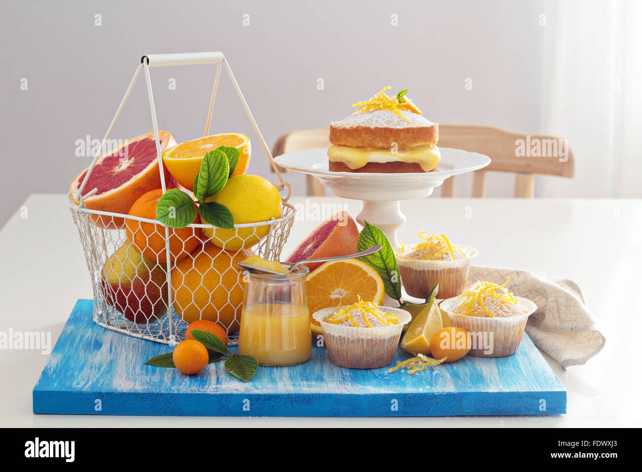 Citrus candy bar with fresh citrus fruits and cakes Stock Photo - Alamy
