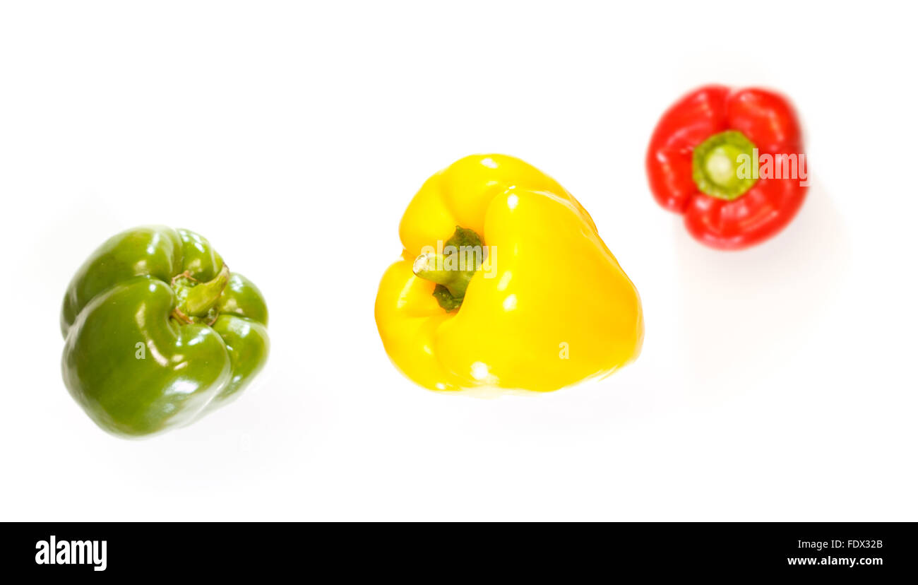 Top view of three bell peppers falling down Stock Photo Alamy