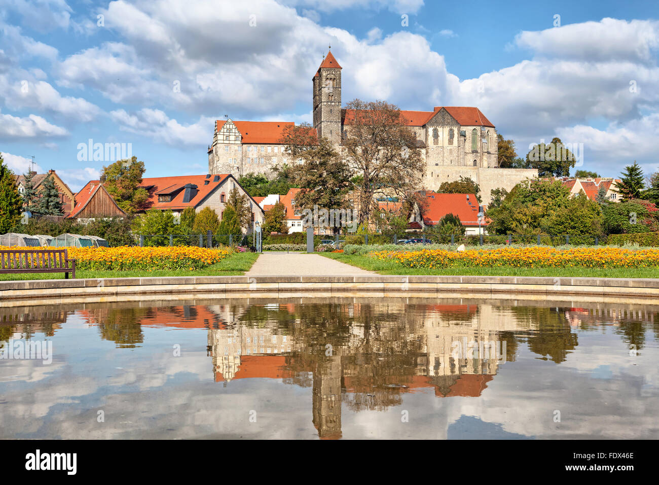 Castle and church reflecting in pond, Quedlinburg, Germany Stock Photo