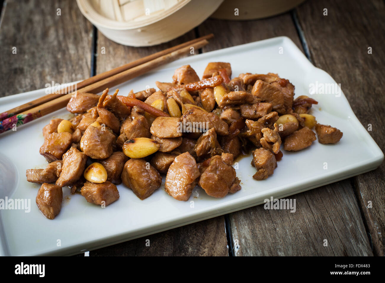 stir fry chicken with almonds chinesse style Stock Photo - Alamy