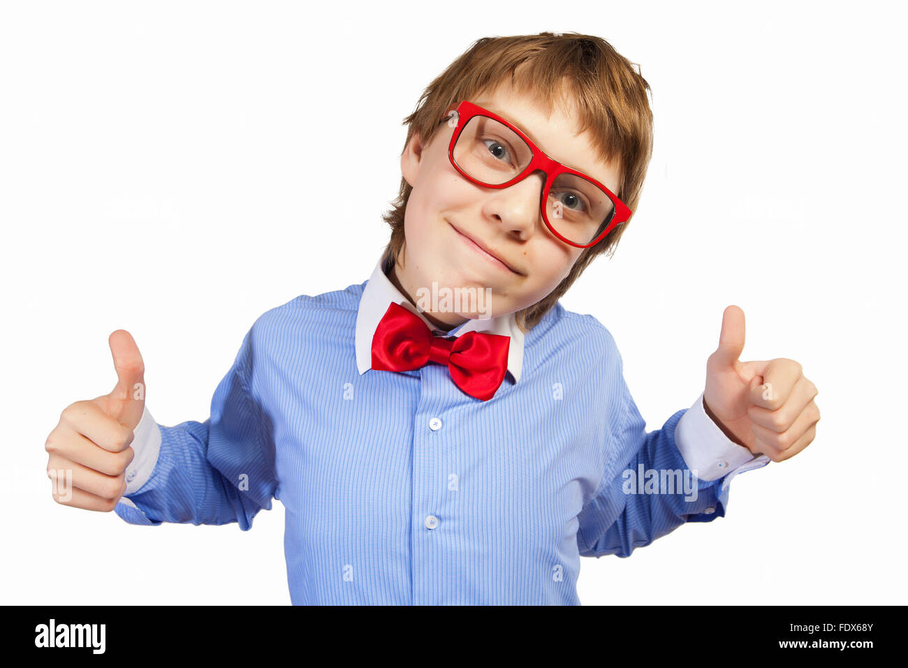 Image of schoolboy smiling showing thumbs up Stock Photo - Alamy