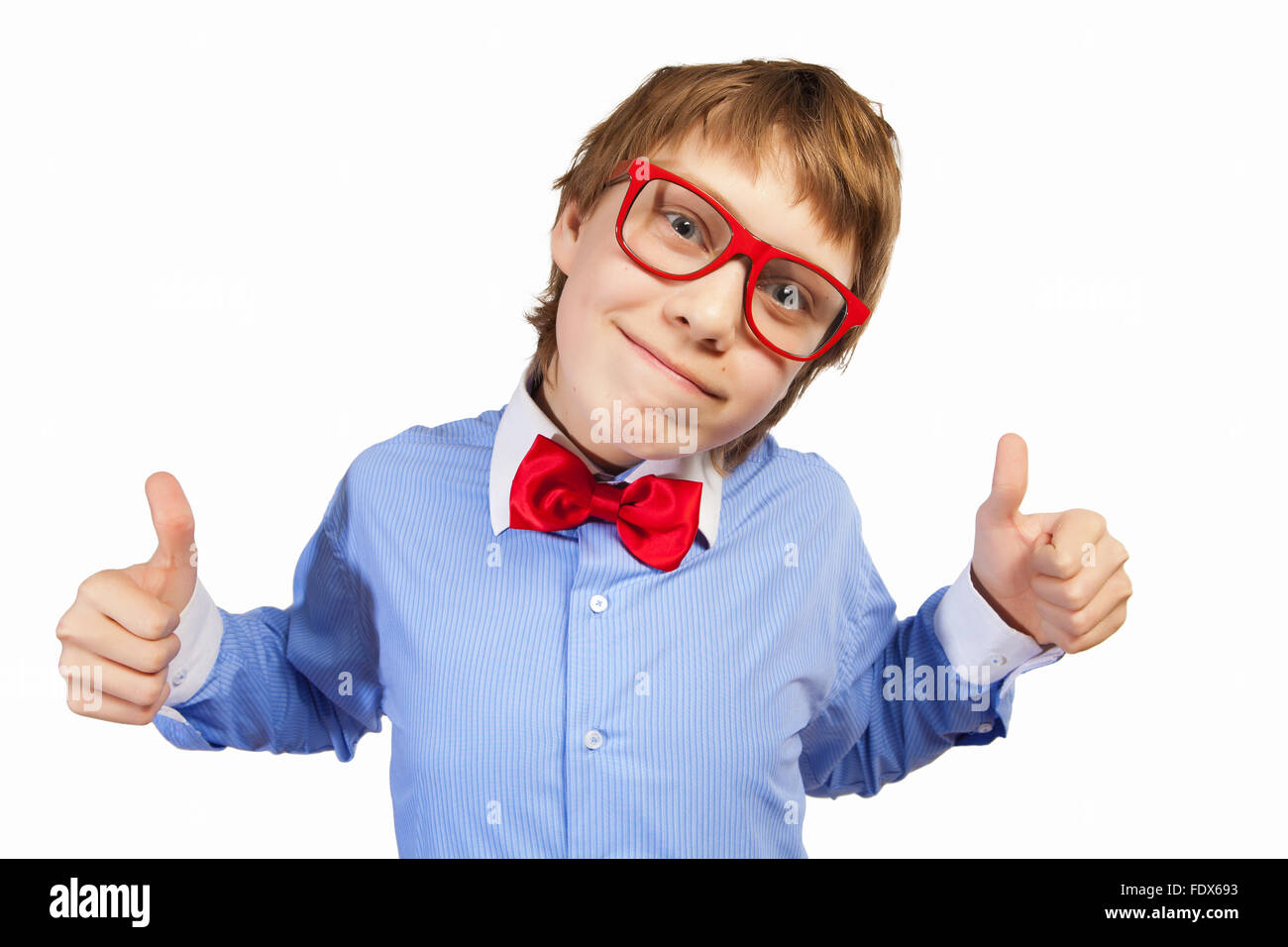 Image of schoolboy smiling showing thumbs up Stock Photo - Alamy