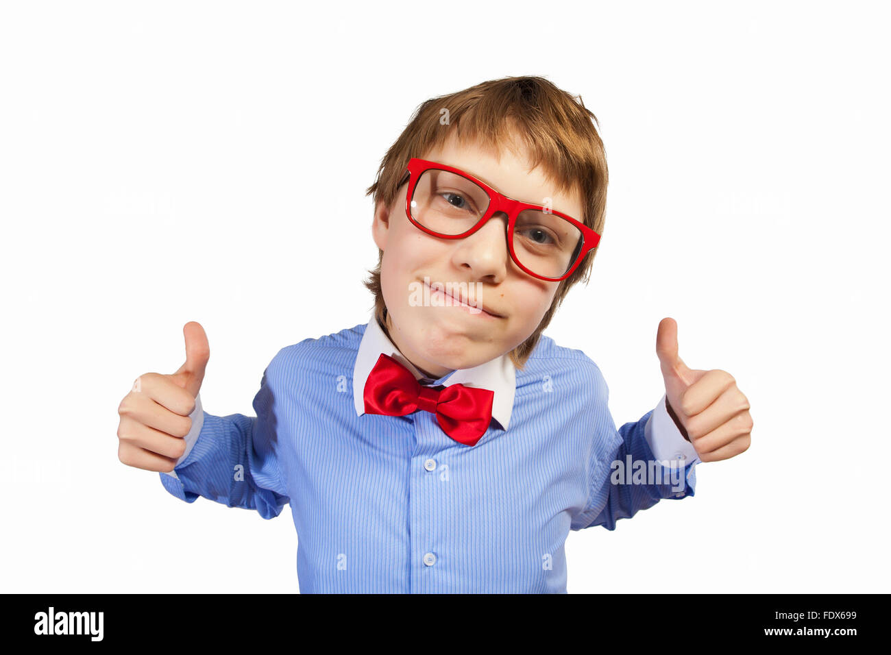 Image of schoolboy smiling showing thumbs up Stock Photo - Alamy