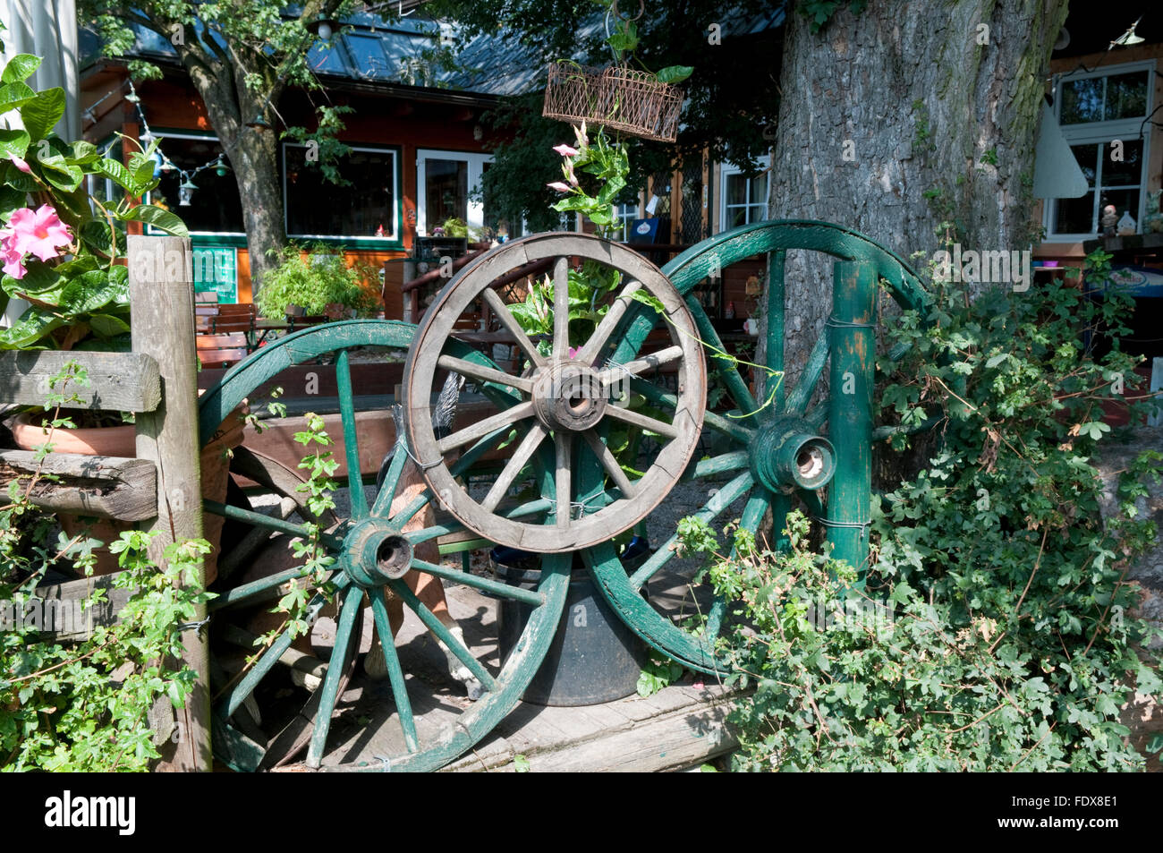 Old wagon wheels used to make an attractive fence at a heuriger wine restaurant in Kahlenberg