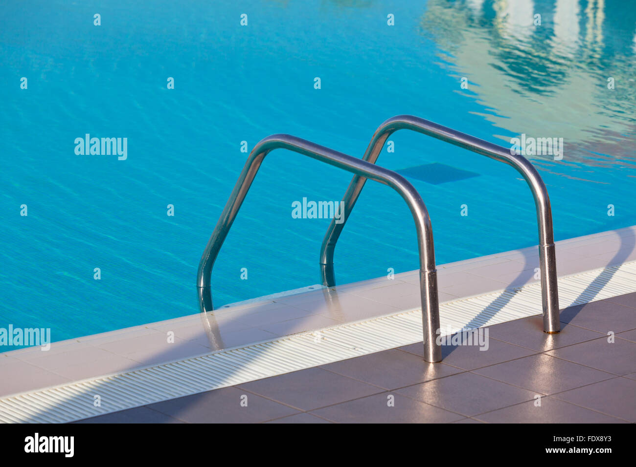 Ladder of a swimming pool. Horizontal shot Stock Photo - Alamy