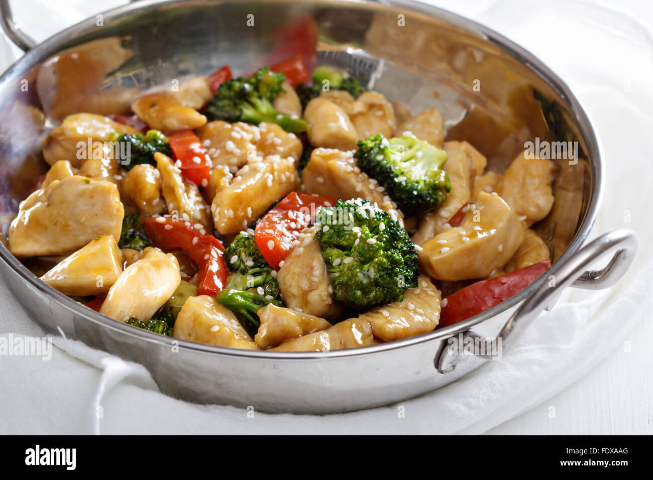 Chicken, broccoli and red pepper stir fry Stock Photo Alamy
