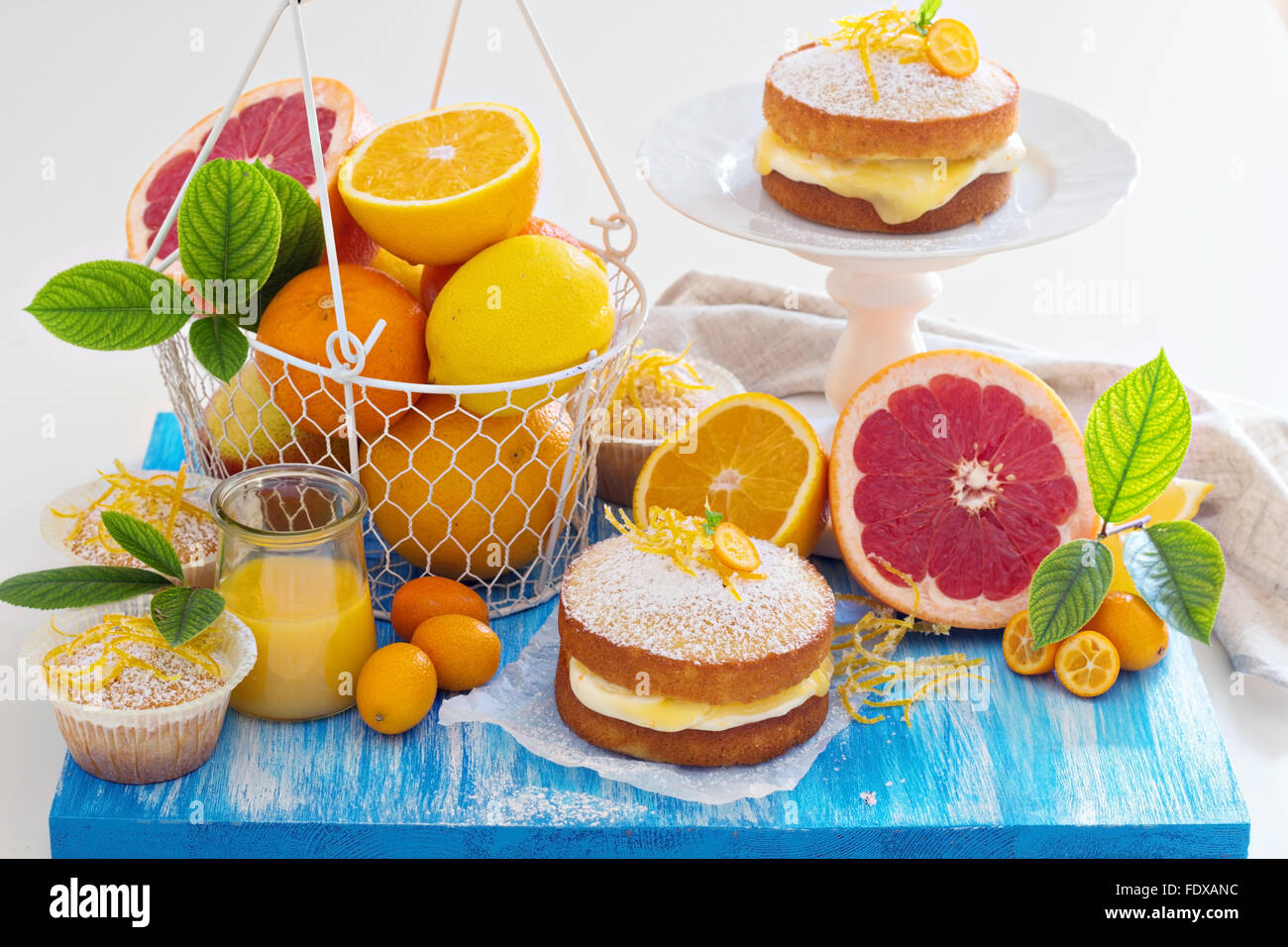 Citrus Victoria Sponge Cake with Lemon Curd and variety of fresh citrus