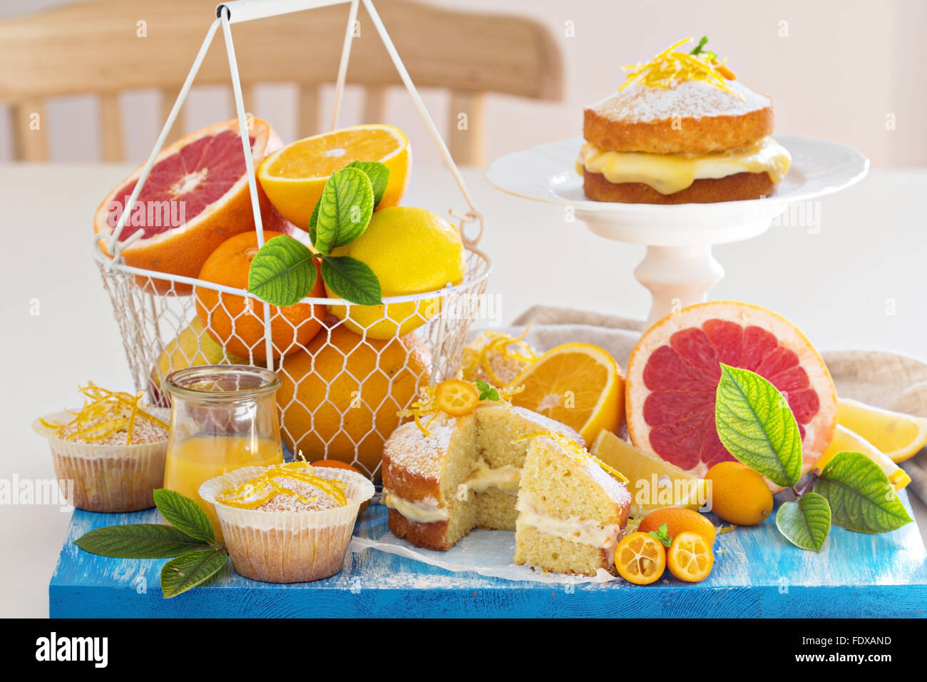 Citrus Victoria Sponge Cake with Lemon Curd and variety of fresh citrus