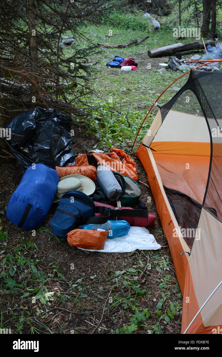 Backpacking tent and other gear at campsite in Northern New Mexico - USA Stock Photo