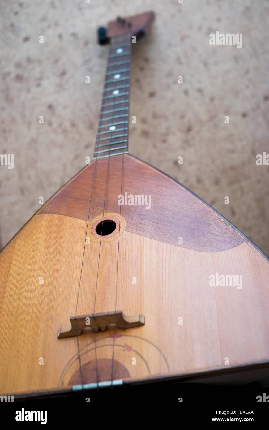 The balalaika is a Russian stringed musical instrument Stock Photo