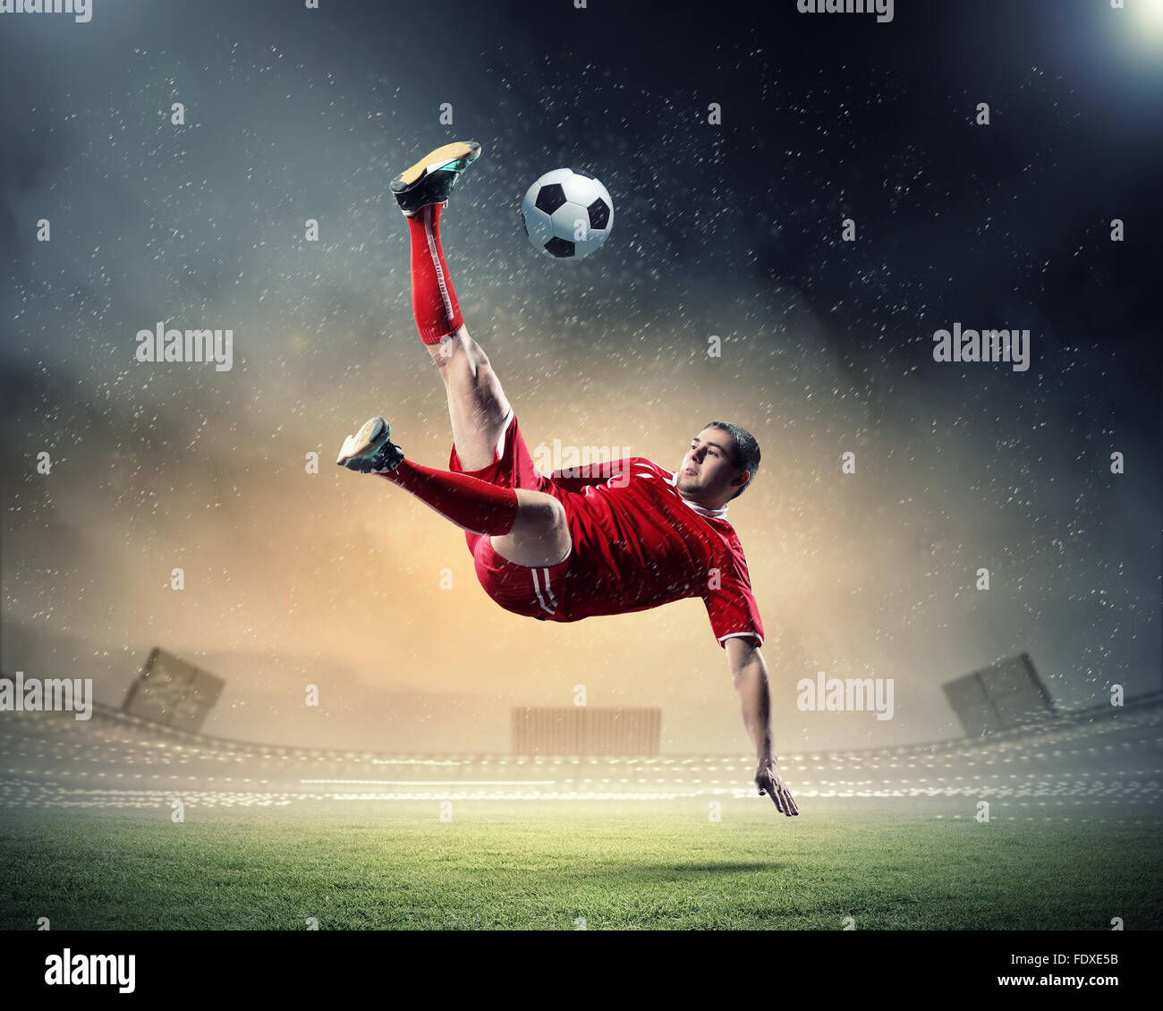 Image of football player at stadium hitting ball Stock Photo Alamy