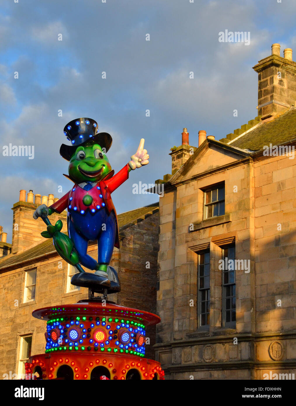 Jiminy Cricket atop one of the funfair rides in St Andrews, fife
