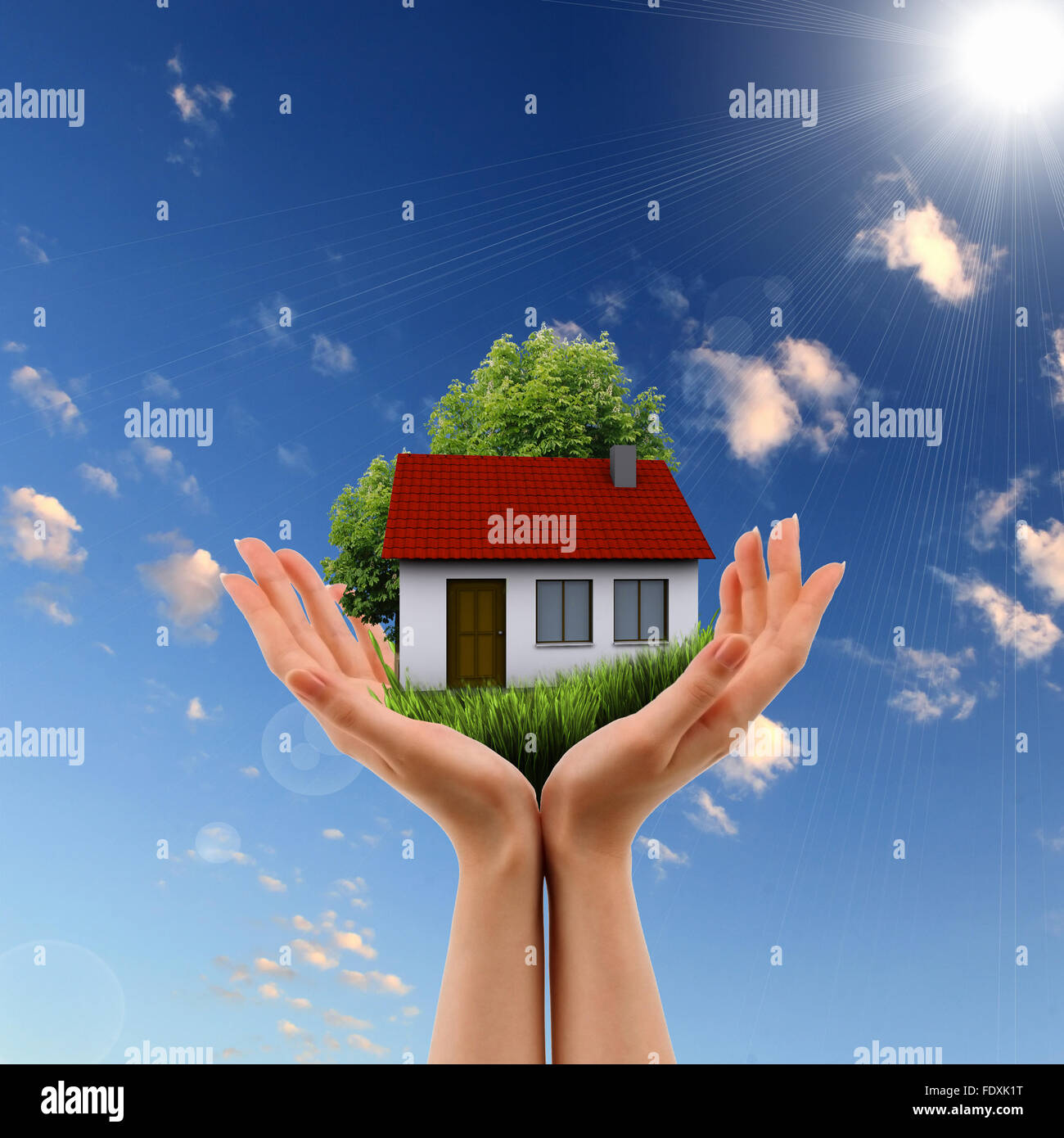 Human hand against blue sky background and house Stock Photo - Alamy