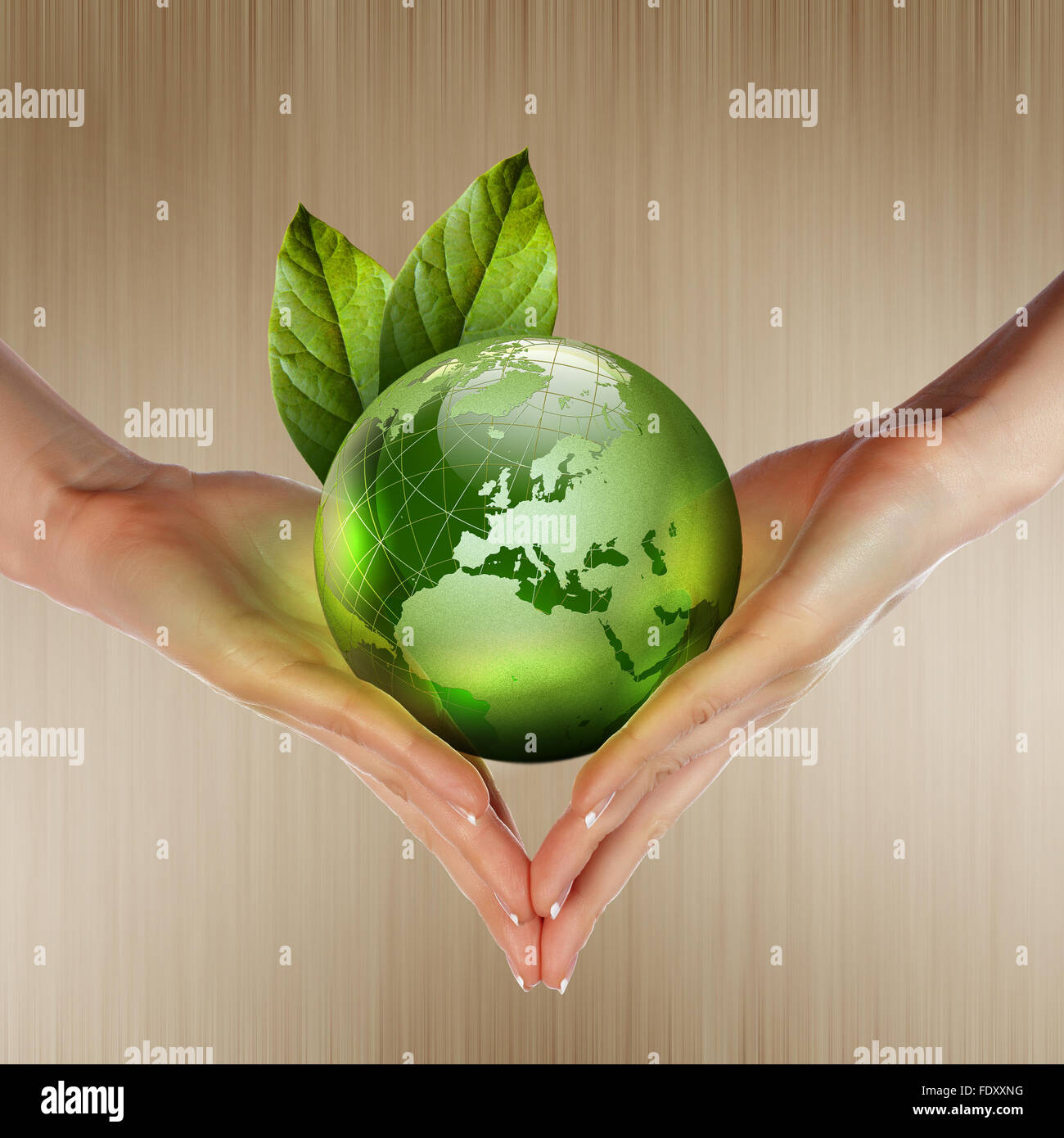 human hands holding green earth with a growing plant Stock Photo - Alamy