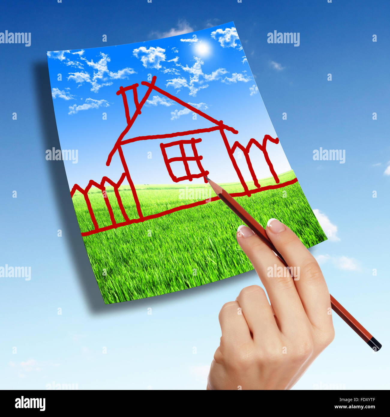 Picture of a house from white clouds against blue sky Stock Photo - Alamy
