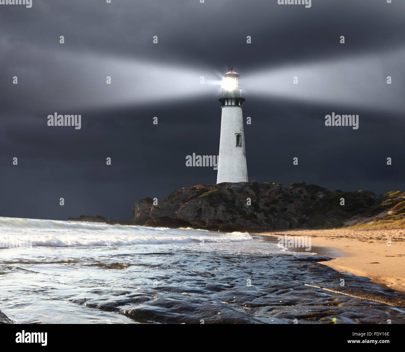 Collage with lighthouse at night with beam of light Stock Photo - Alamy