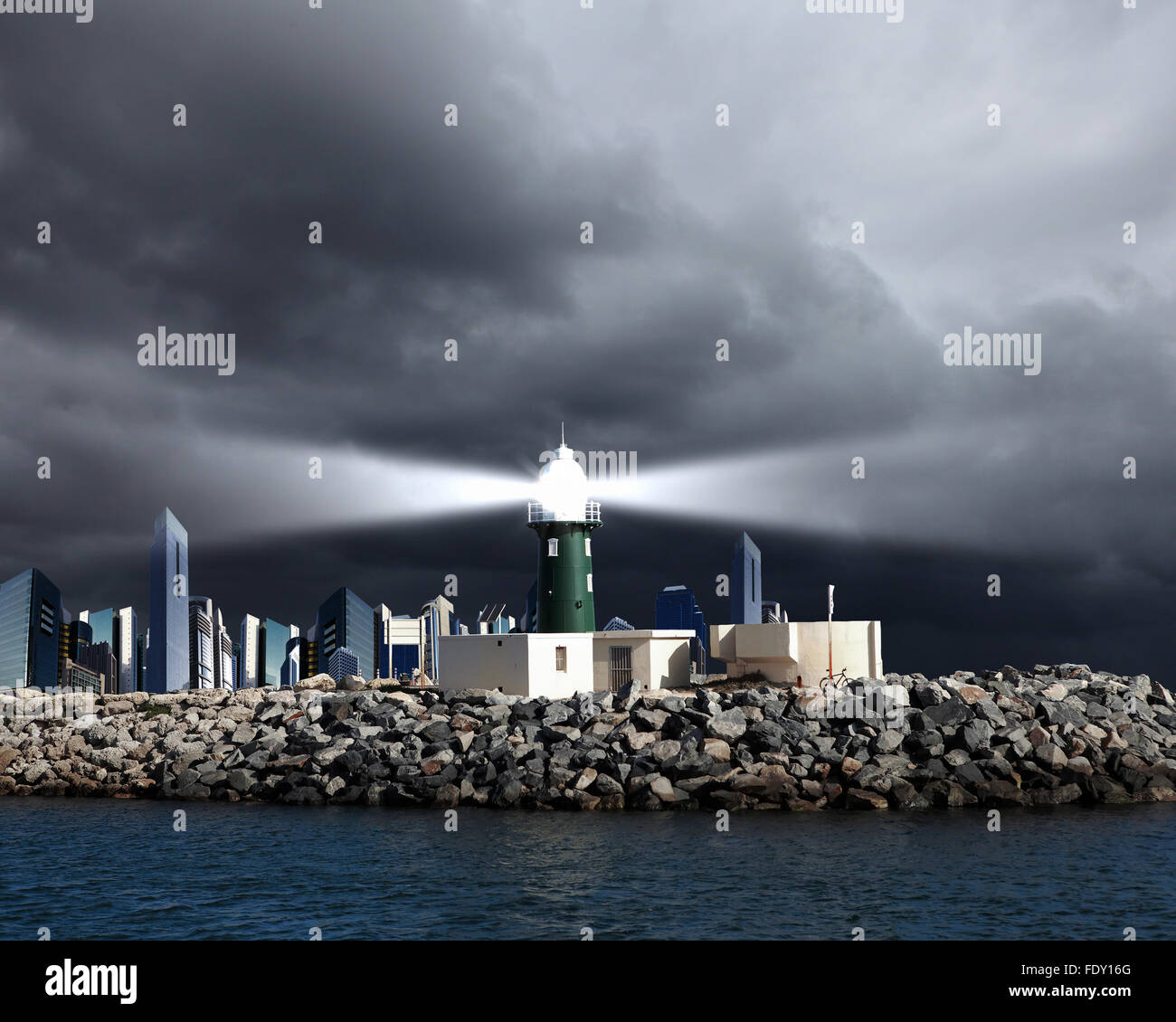Collage with lighthouse at night with beam of light Stock Photo - Alamy