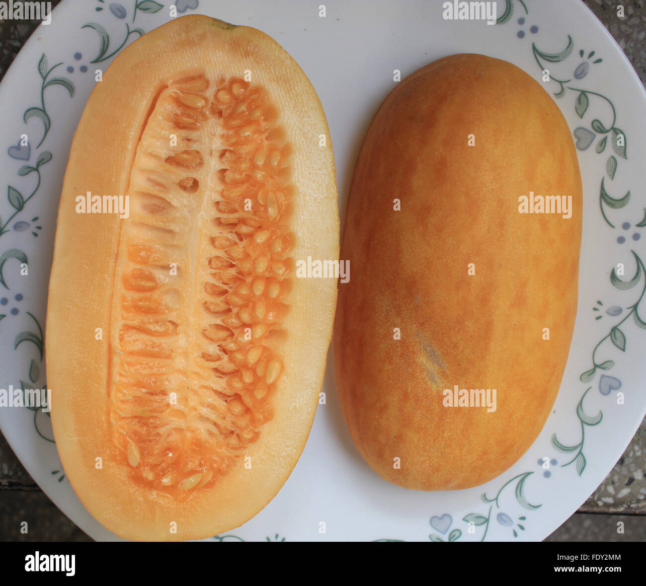 Snap melon, Cucumis melo var momordica, oval fruit consumed as cucumber