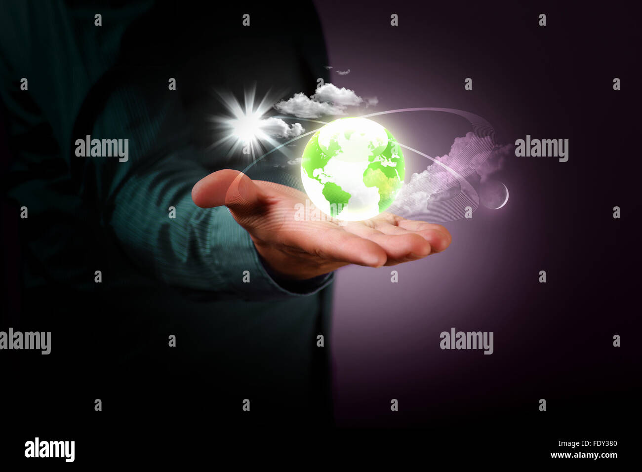 Man holding a glowing earth globe in his hands Stock Photo - Alamy