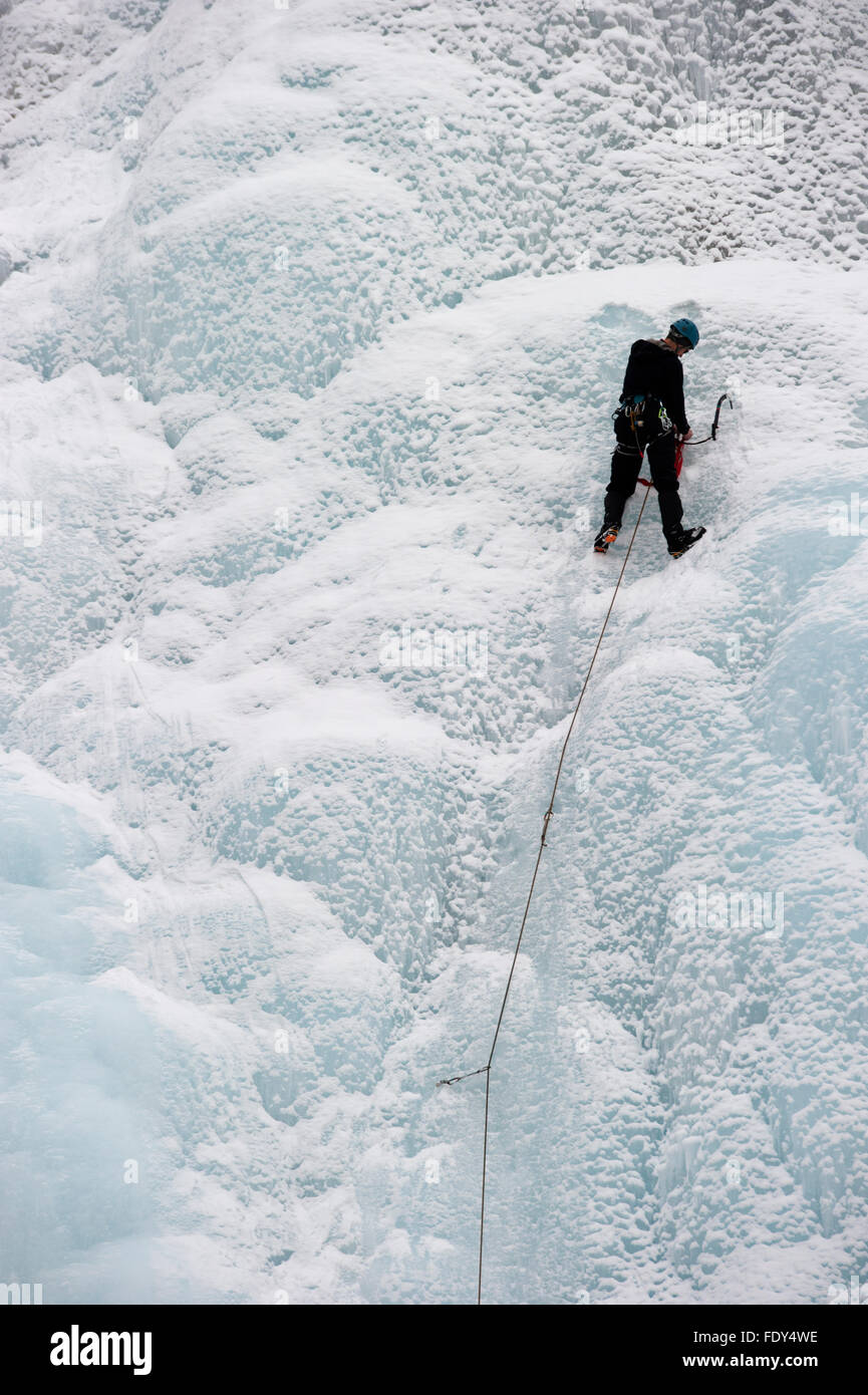 Ice-climbing on frozen waterfall, Icefields Parkway, Jasper National park, Alberta, Canada Stock Photo