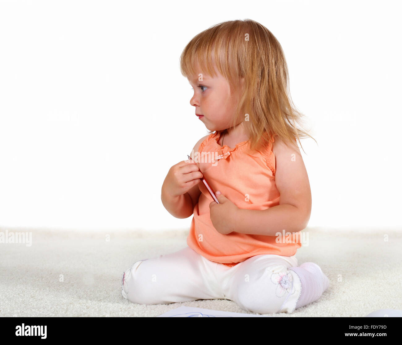 Portrait of a little blond girl in studio Stock Photo - Alamy
