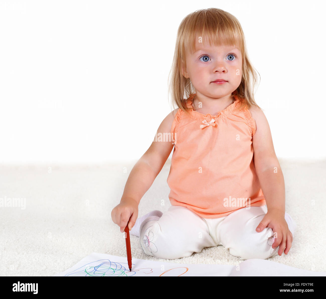 Portrait of a little blond girl in studio Stock Photo - Alamy