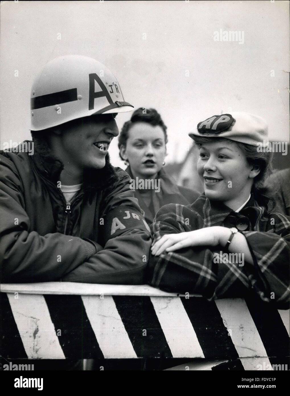 1955 - Wearing their distinctive white hats and their armbands, two members of the Air Police at Burtonwood, they are Wayne Pittman of Alexandria, Louisiana and Carol McGingan of Long Island, New York. American Children Join Air Police: The U.S. Air Force in Britain have enrolled 15 children in their Air Police. They are all under 16 and have been formed in an Air Police Squadron. Their duties include keeping discipline among their fellow pupils, giving first aid to children and enforcing road safety. The squadron is stationed at Burtonwood, the American airbase in Lancashire. All the boys and Stock Photo