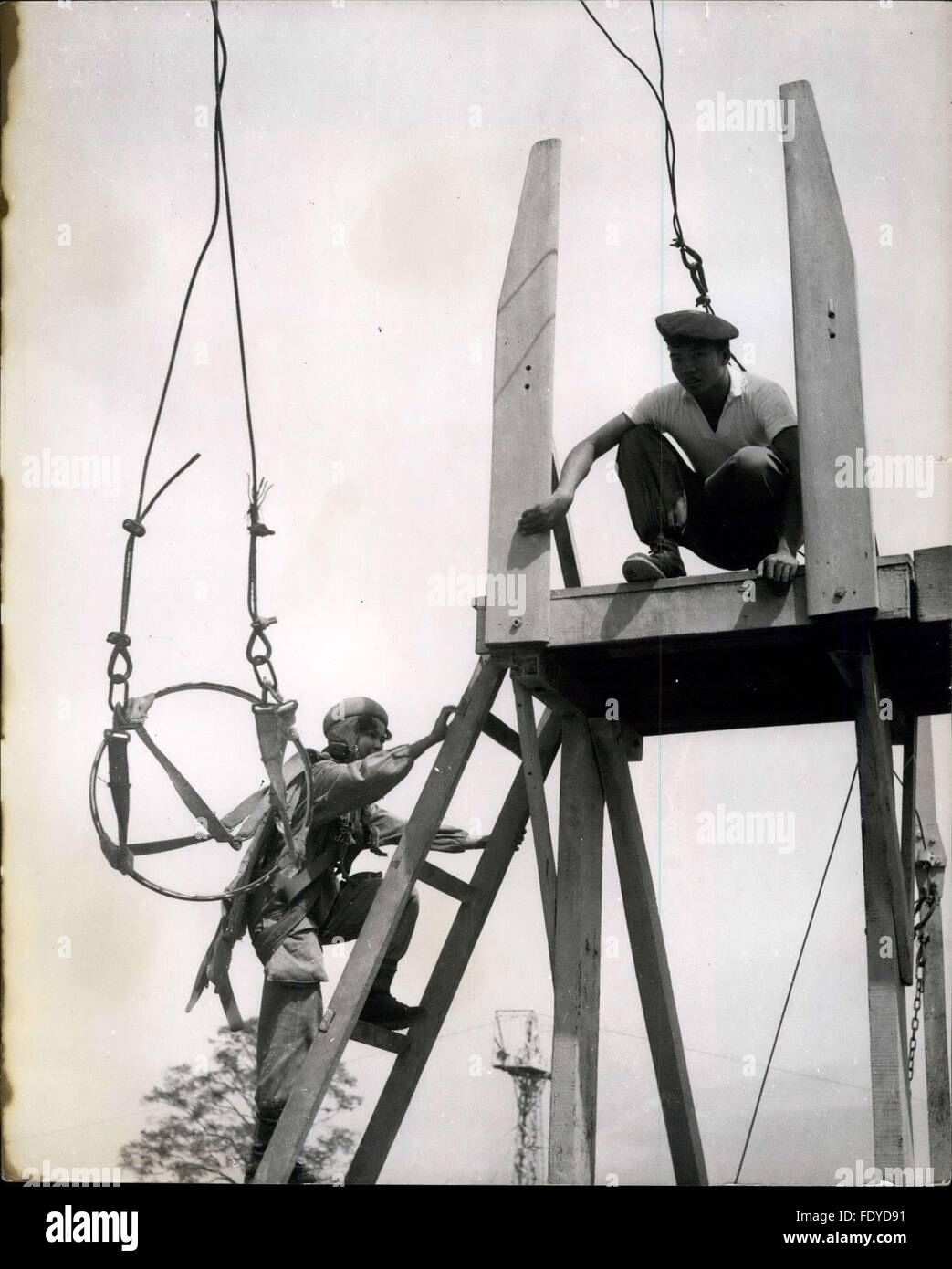 1944 A Vietnamese parachutistintraining climbs to the jumping