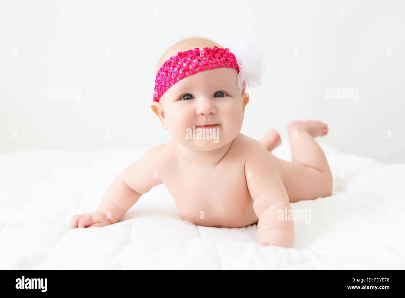 Portrait of a young child on a white background. Baby Stock Photo - Alamy