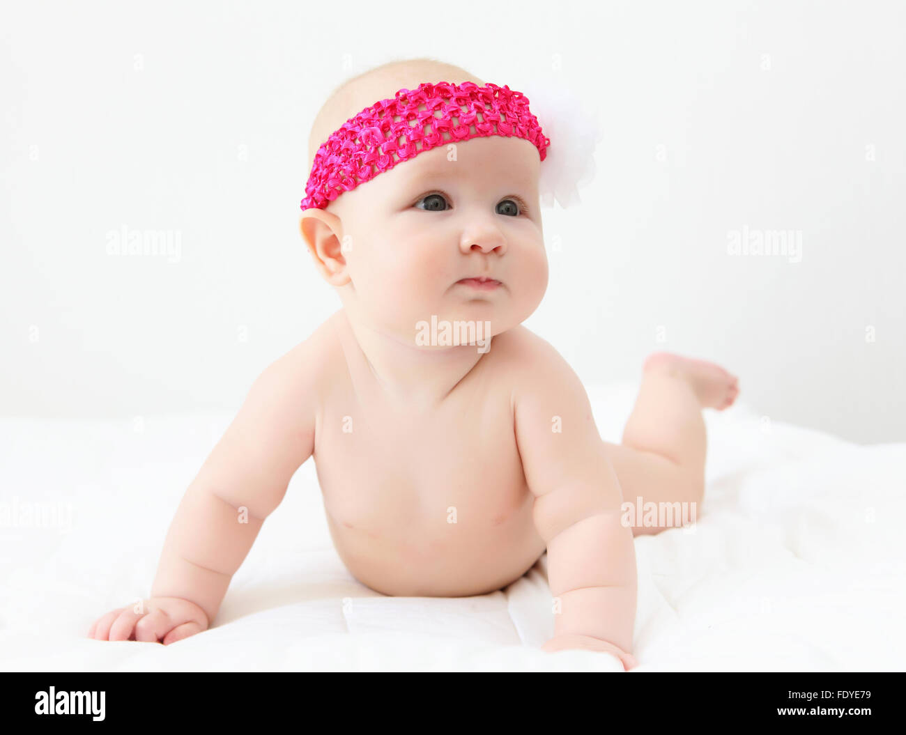 Portrait of a young child on a white background. Baby Stock Photo - Alamy