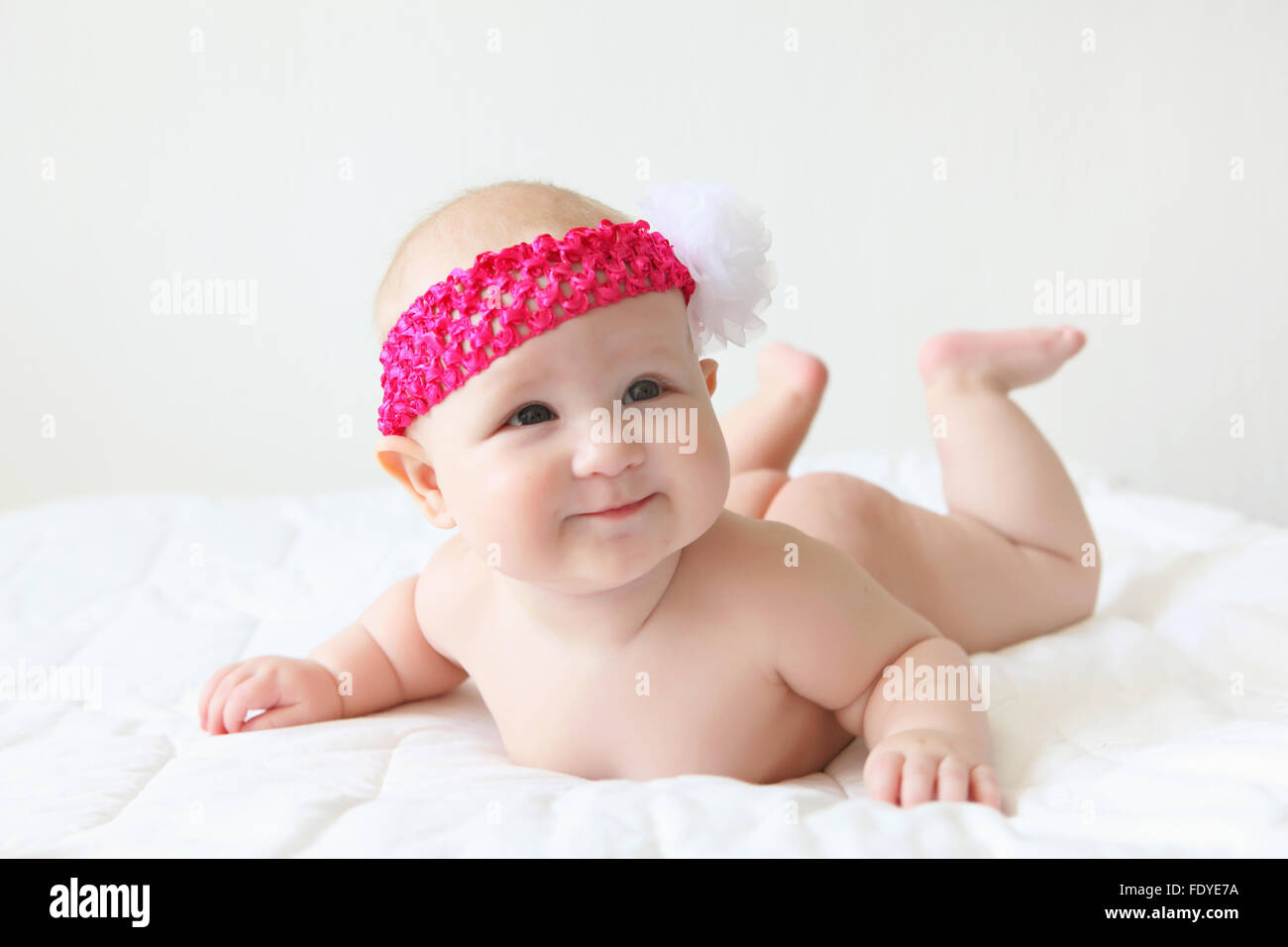 Portrait of a young child on a white background. Baby Stock Photo - Alamy