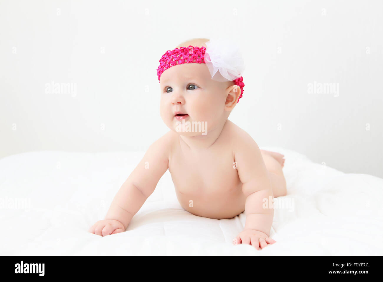Portrait of a young child on a white background. Baby Stock Photo - Alamy