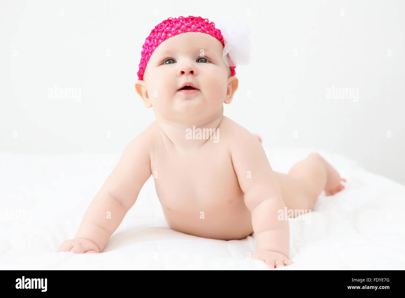 Portrait of a young child on a white background. Baby Stock Photo - Alamy