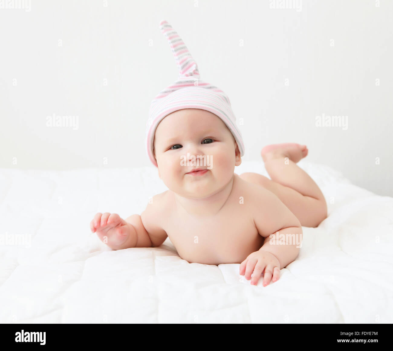 Portrait of a young child on a white background. Baby Stock Photo - Alamy