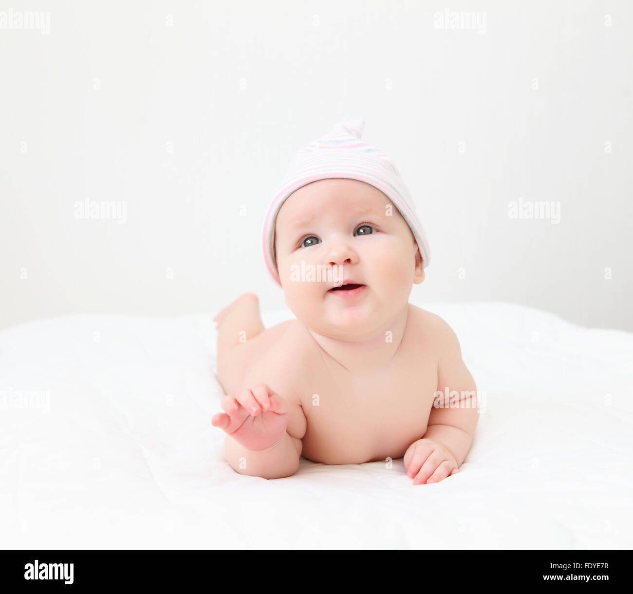 Portrait of a young child on a white background. Baby Stock Photo - Alamy