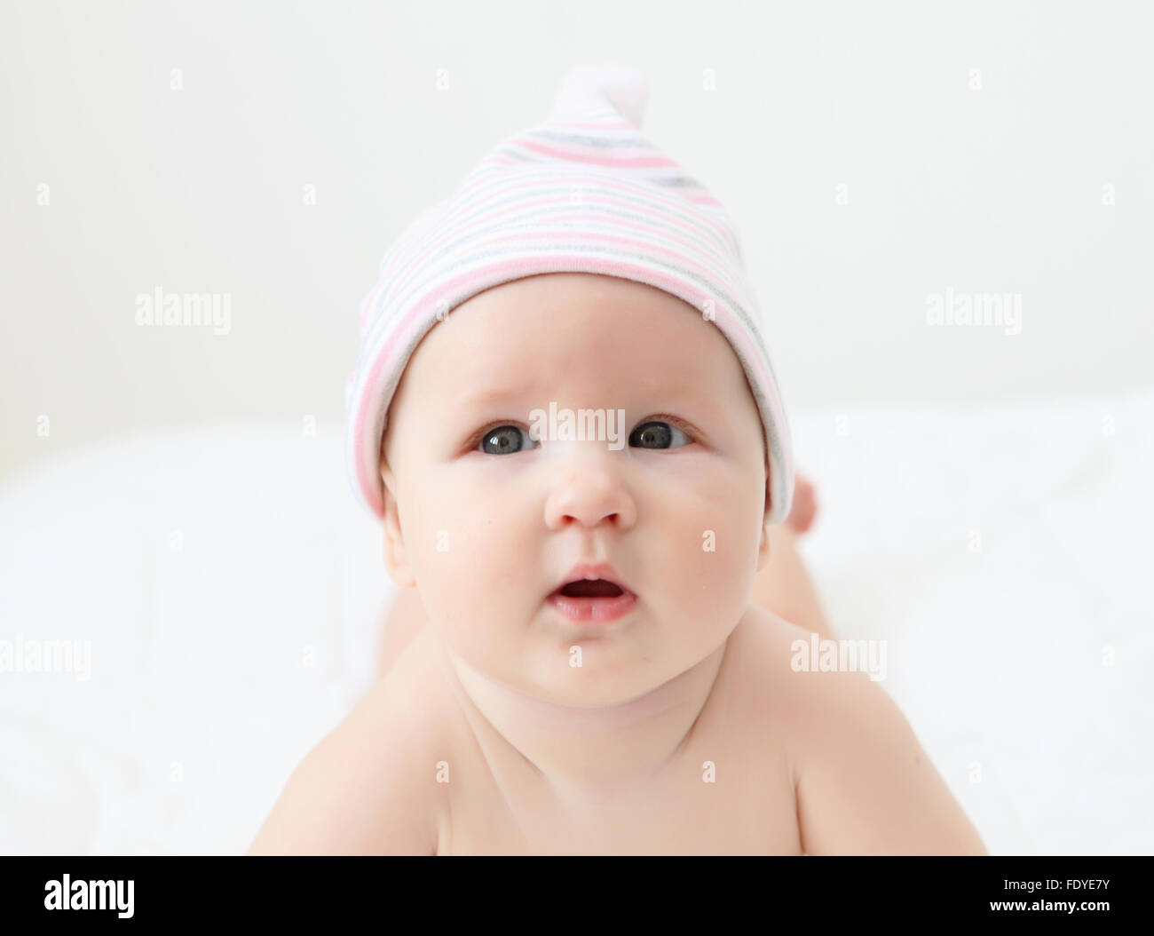 Portrait of a young child on a white background. Baby Stock Photo - Alamy