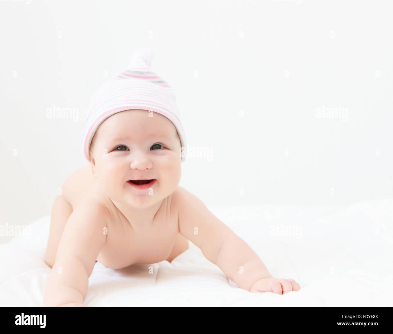 Portrait of a young child on a white background. Baby Stock Photo - Alamy