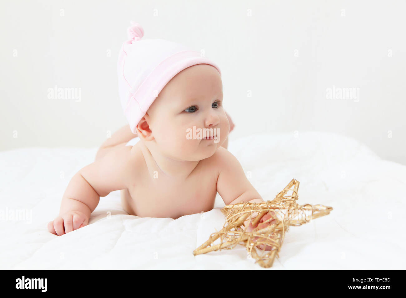 Portrait of a young child on a white background. Baby Stock Photo - Alamy