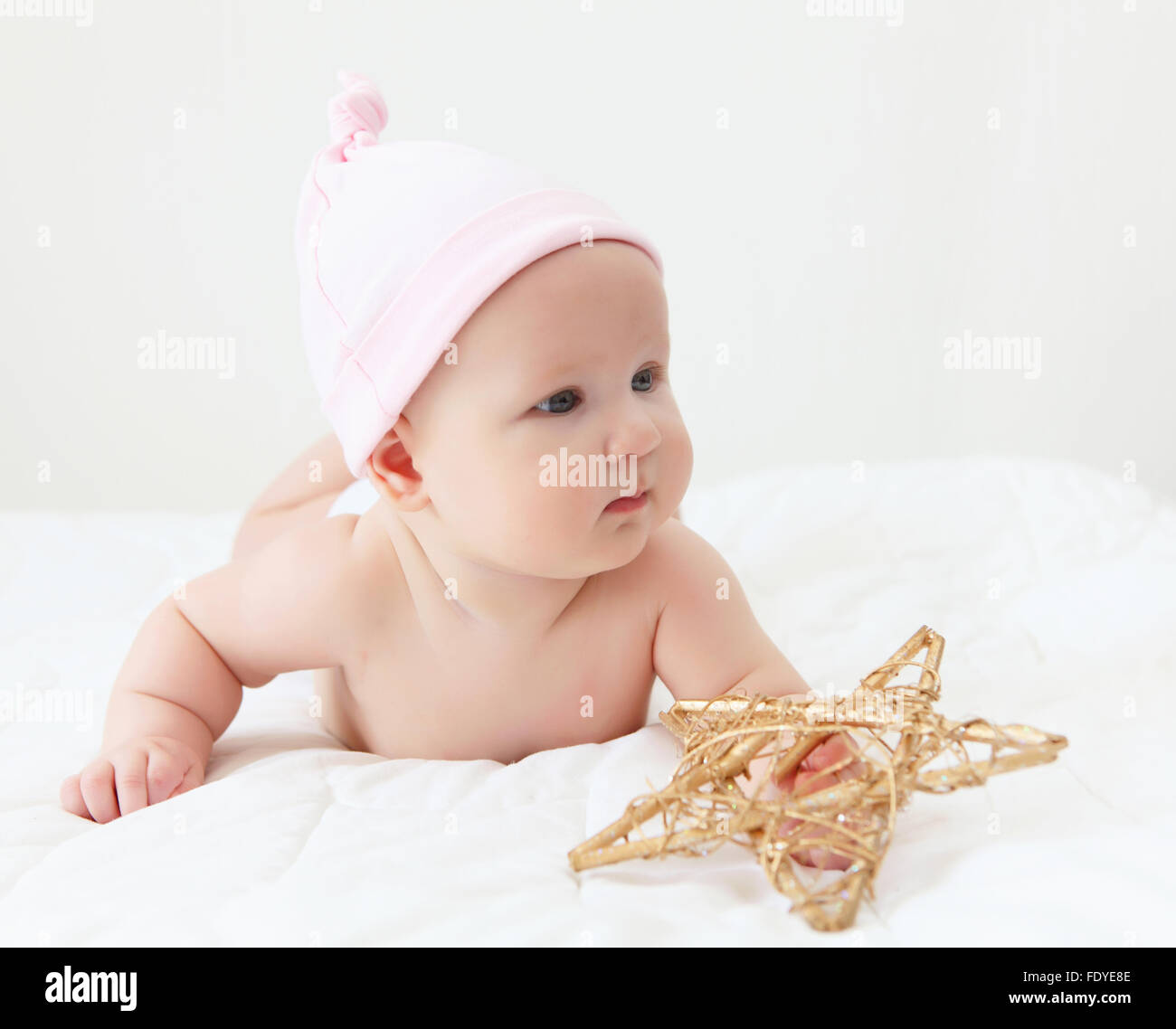 Portrait of a young child on a white background. Baby Stock Photo - Alamy