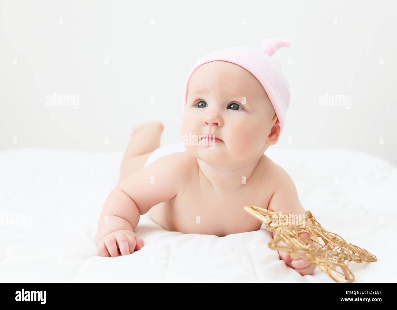 Portrait of a young child on a white background. Baby Stock Photo - Alamy